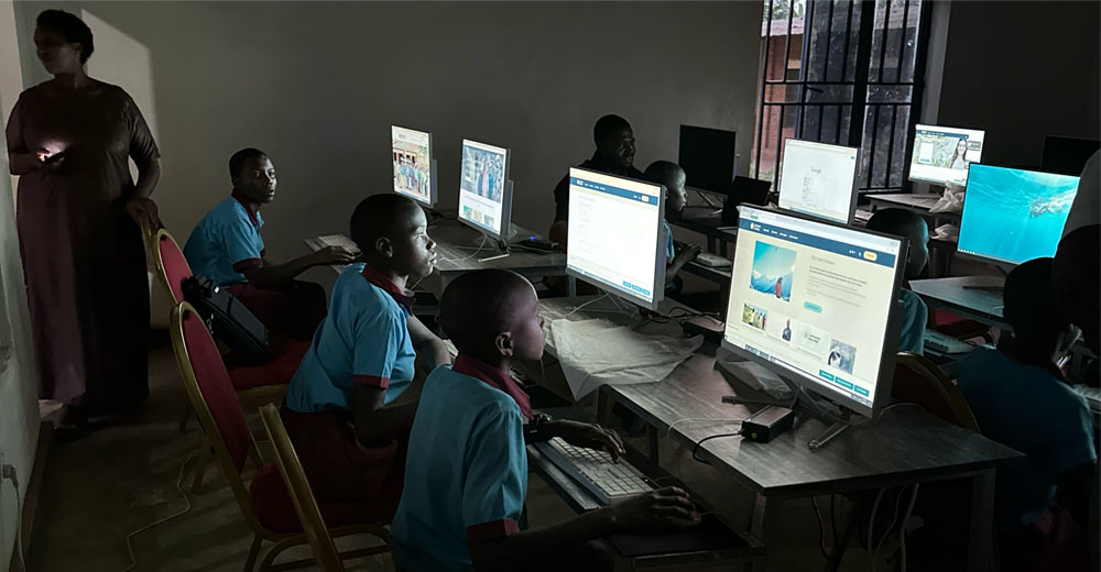 Children sit at computers at an Internet Access Center.