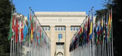 rows of country flags in front of United Nations building