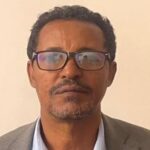 A headshot of Mulugeta Assefa.